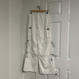 White cargo pants. NEVER WORN.